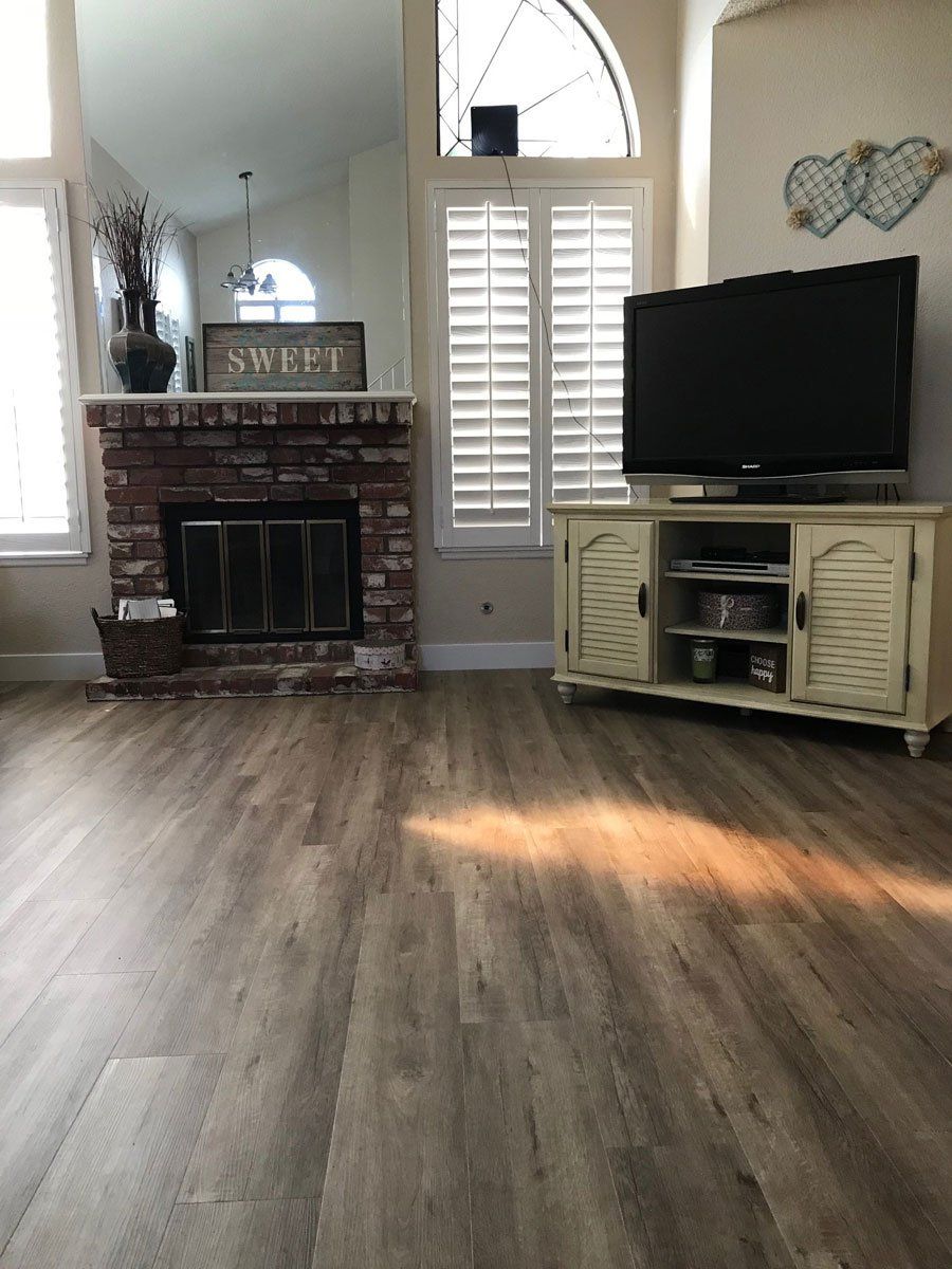 Wide Living Room with Vinyl Flooring — Riverside, CA — Vallin Bros Contractors