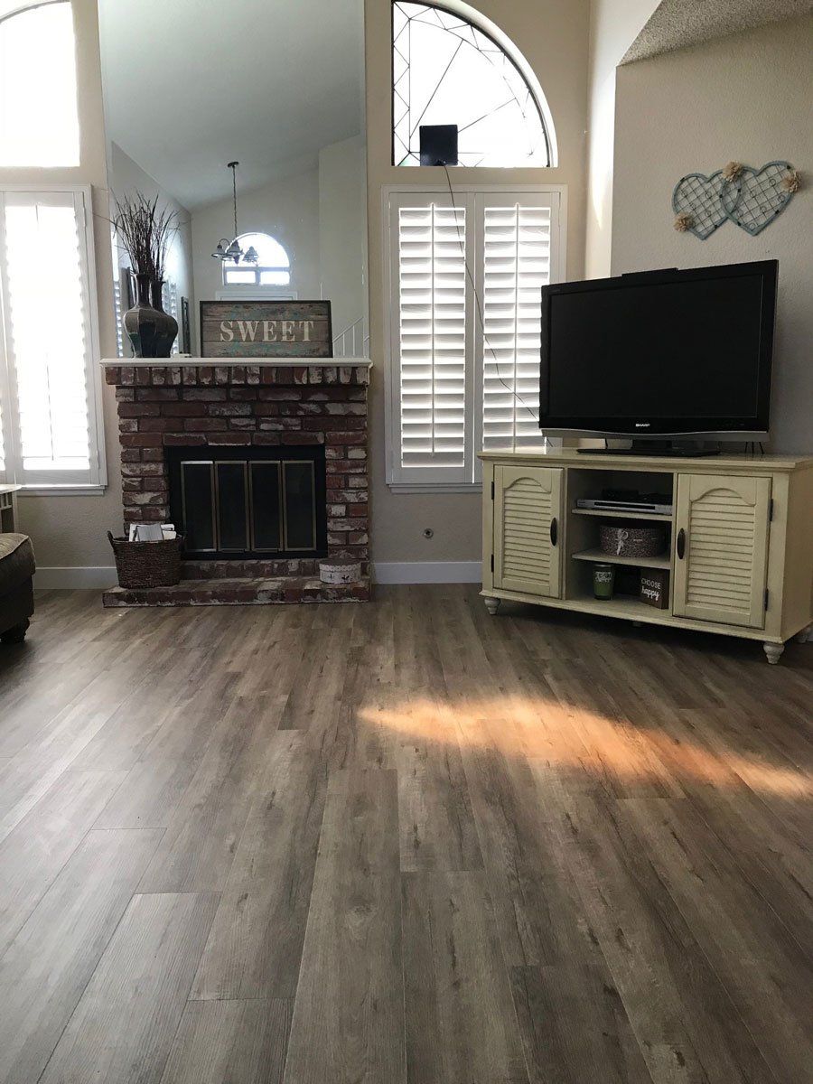 Side View of Wide Living Room with Vinyl Flooring — Riverside, CA — Vallin Bros Contractors