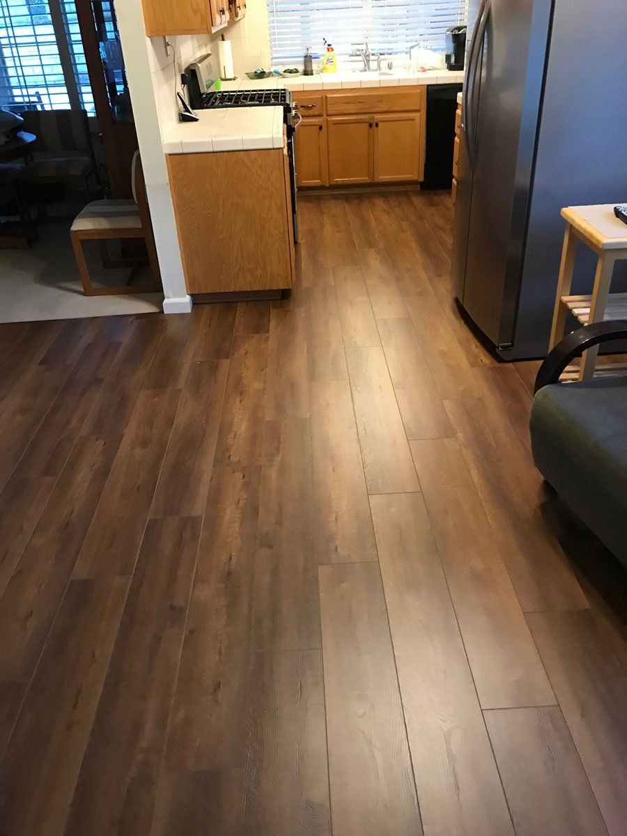 Kitchen with Laminate Floor — Riverside, CA — Vallin Bros Contractors