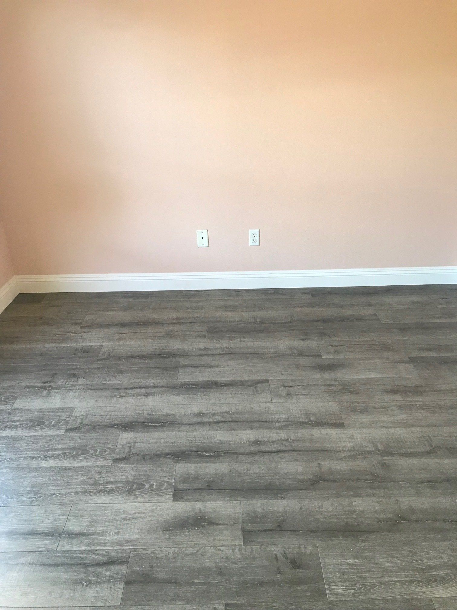 Empty Room With Vinyl Floor — Riverside, CA — Vallin Bros Contractors