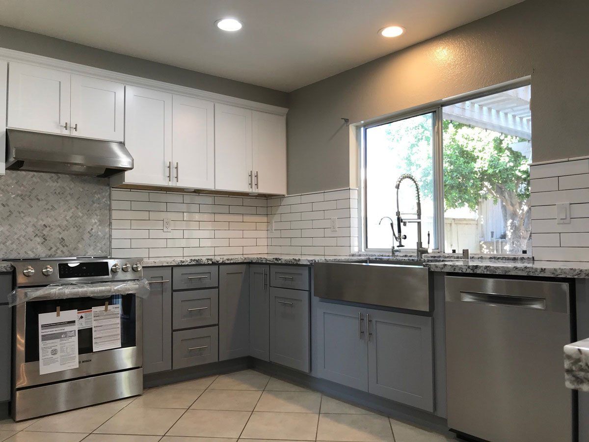 Gray Kitchen Cabinets — Riverside, CA — Vallin Bros Contractors