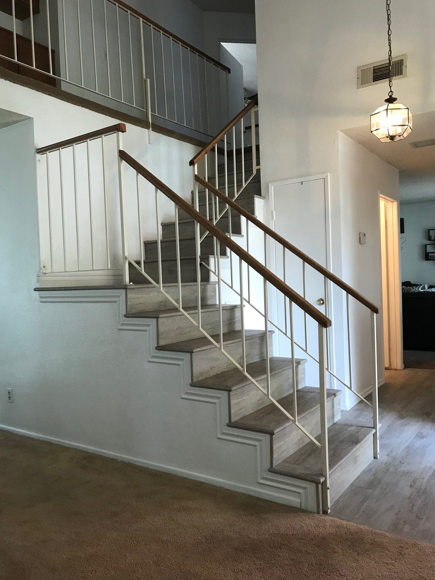 Stairs With Grey Vinyl Floors — Riverside, CA — Vallin Bros Contractors