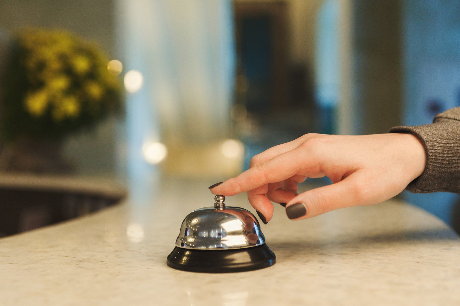 Hand ringing a hotel bell