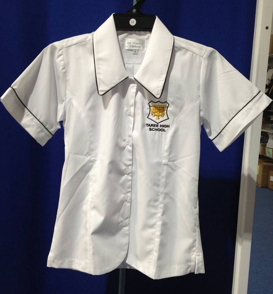 White School Uniform Shirt With Black Trim, Embroidered Emblem, on a Hanger — Workwise Clothing Forster in Forster, NSW