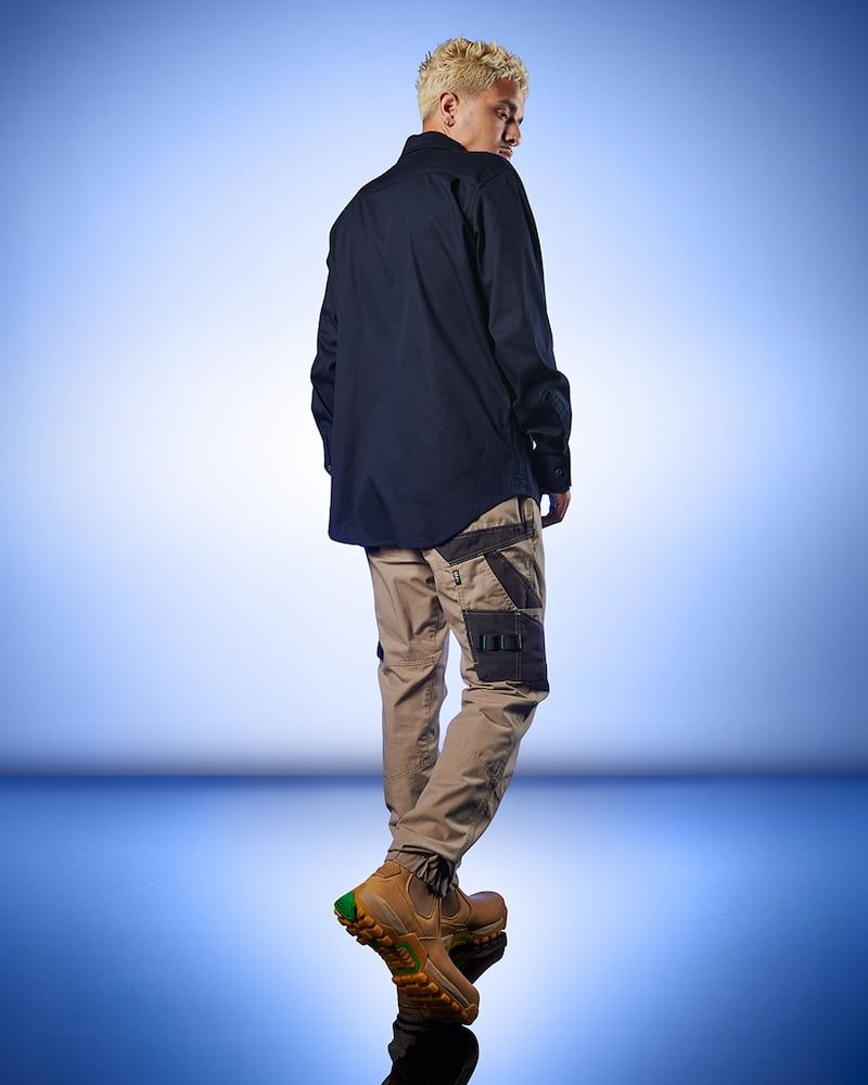 Man With Blonde Hair, Wearing a Black Shirt and Cargo Pants — Workwise Clothing Forster in Forster, NSW