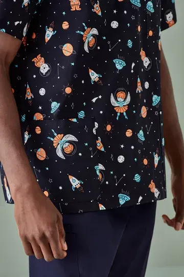 Person Wearing a Dark Patterned Shirt With Space-themed Rockets — Workwise Clothing Forster in Forster, NSW