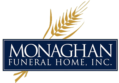 Logo for Monaghan Funeral Home, Inc. featuring a wheat stalk and text on a dark blue rectangle.