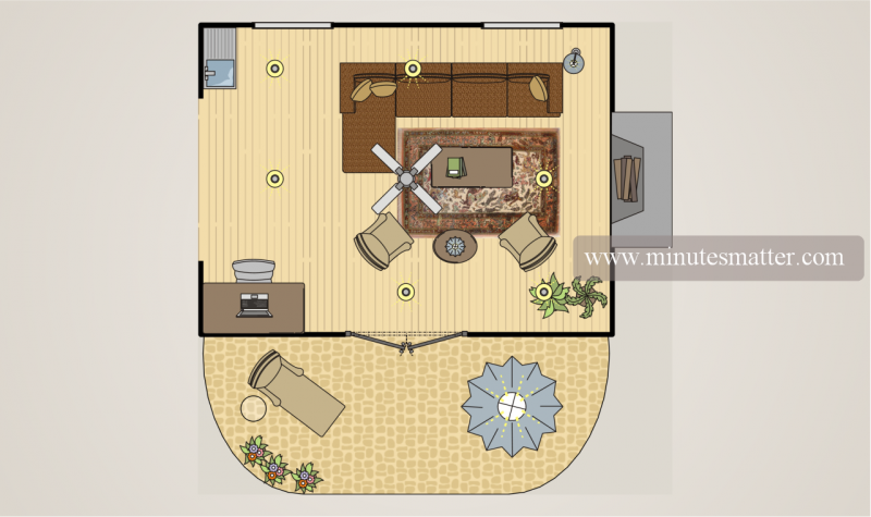 An aerial view of a living room with a couch and chairs