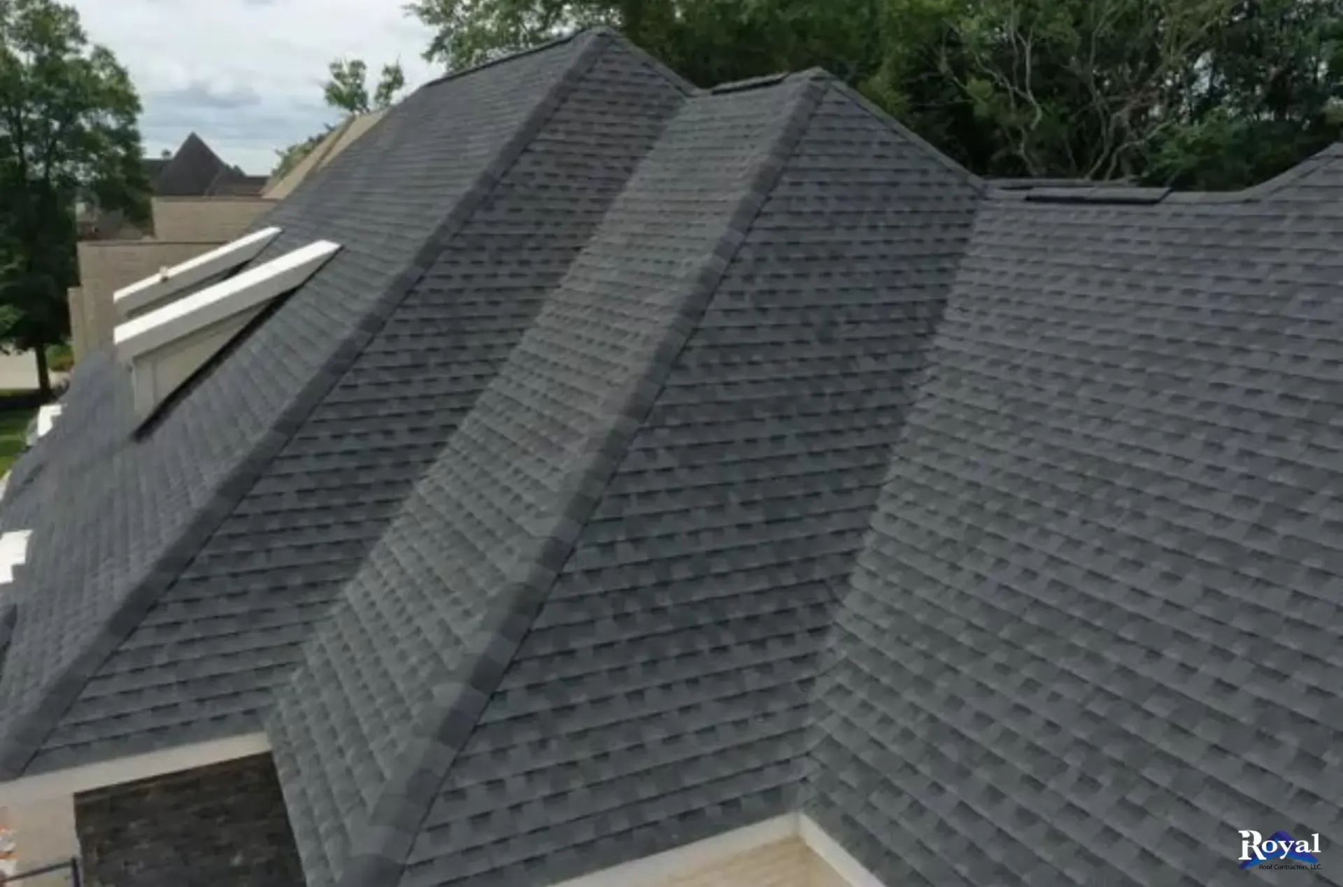 A roof with a gray slate tile