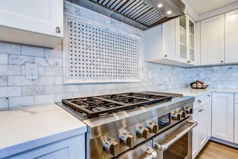 Ovens — Stainless Steel Hood Over Gas Cooktop in Chesapeake, VA