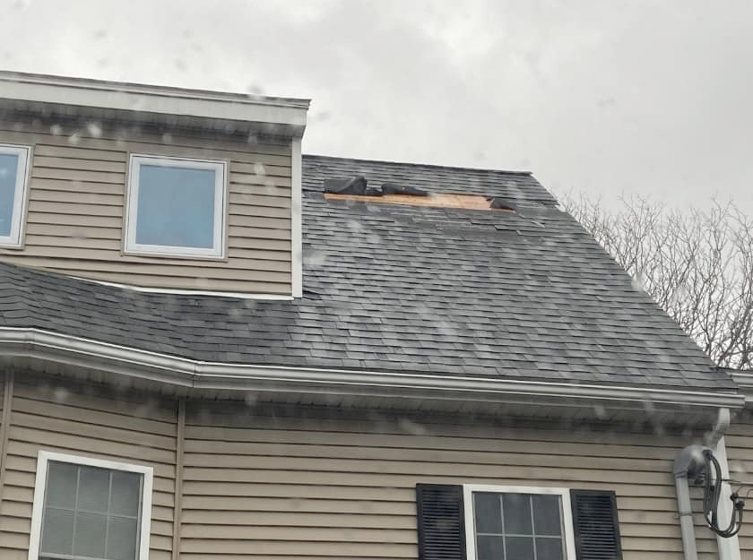 a house with a roof that is missing shingles