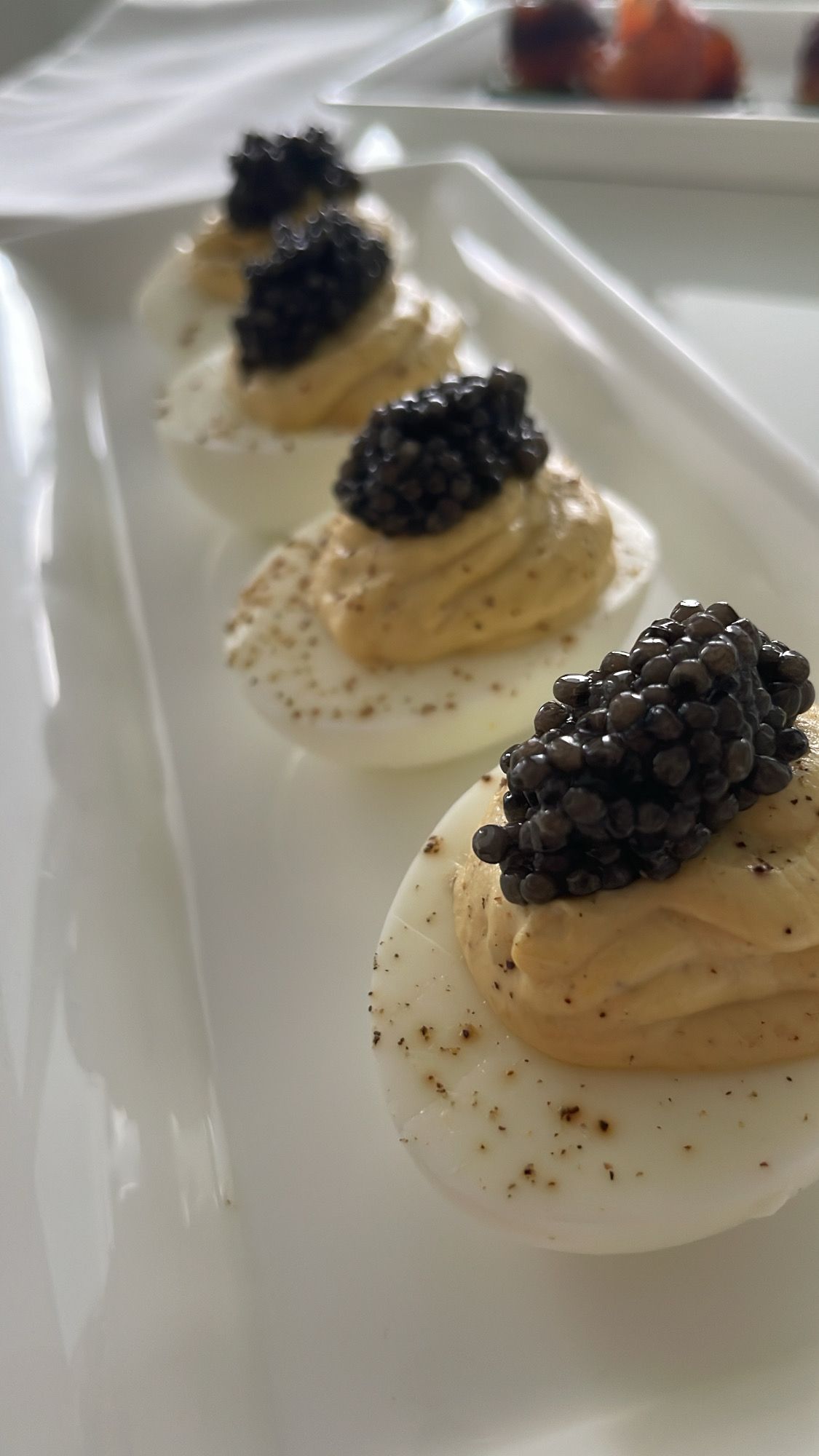 Soigne at Homes Signature Deviled Eggs topped with Royal Osetra Caviar