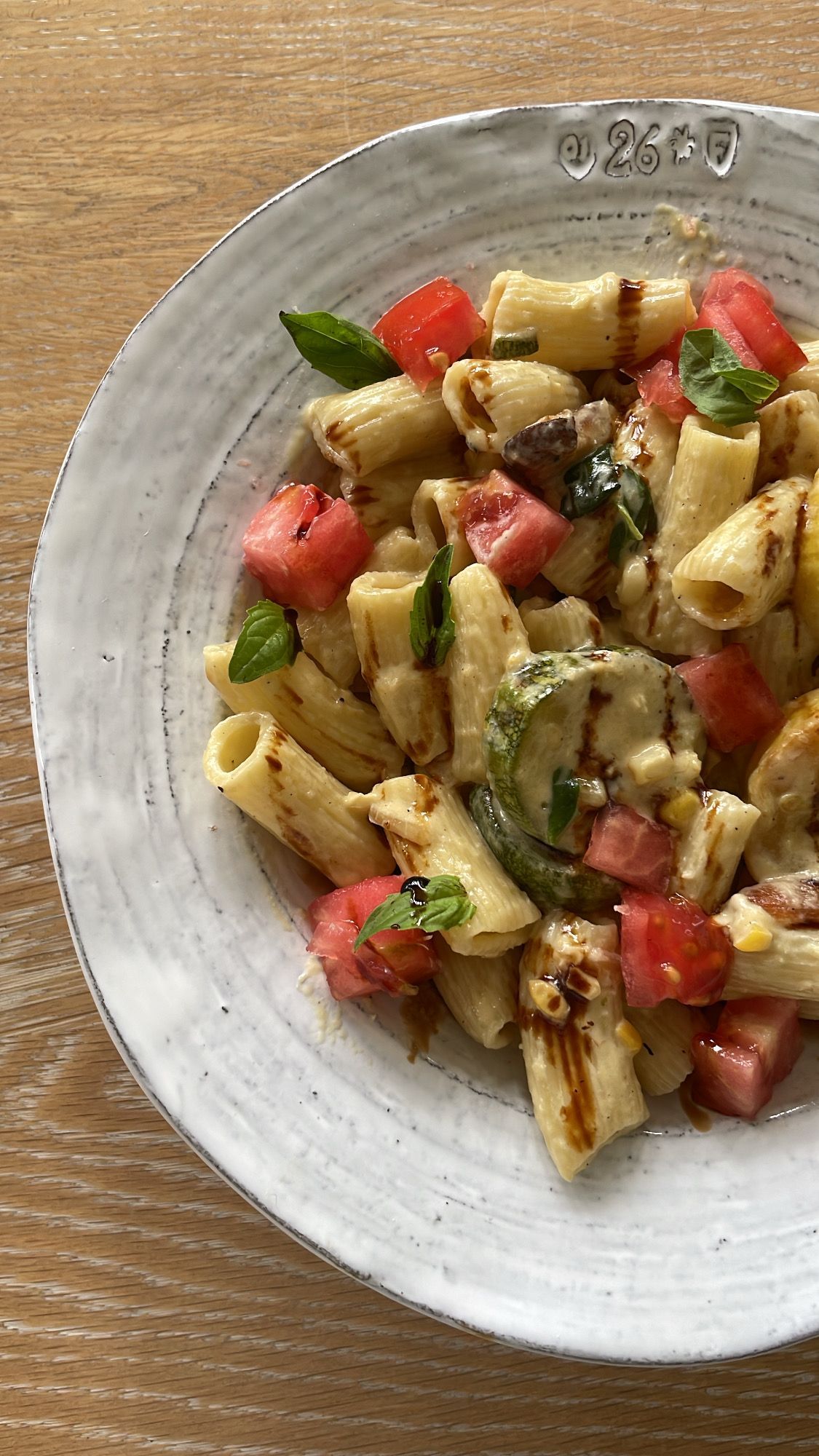 Homemade Rigatoni Pasta with Heirloom Garden tomatoes, Aged Balsamic and Fresh Basil 