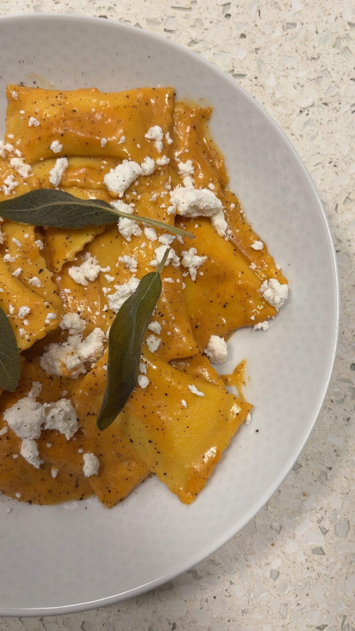 House made Honeynut Squash Agnolotti with Brown Butter , Sage & Aged Goat Cheese