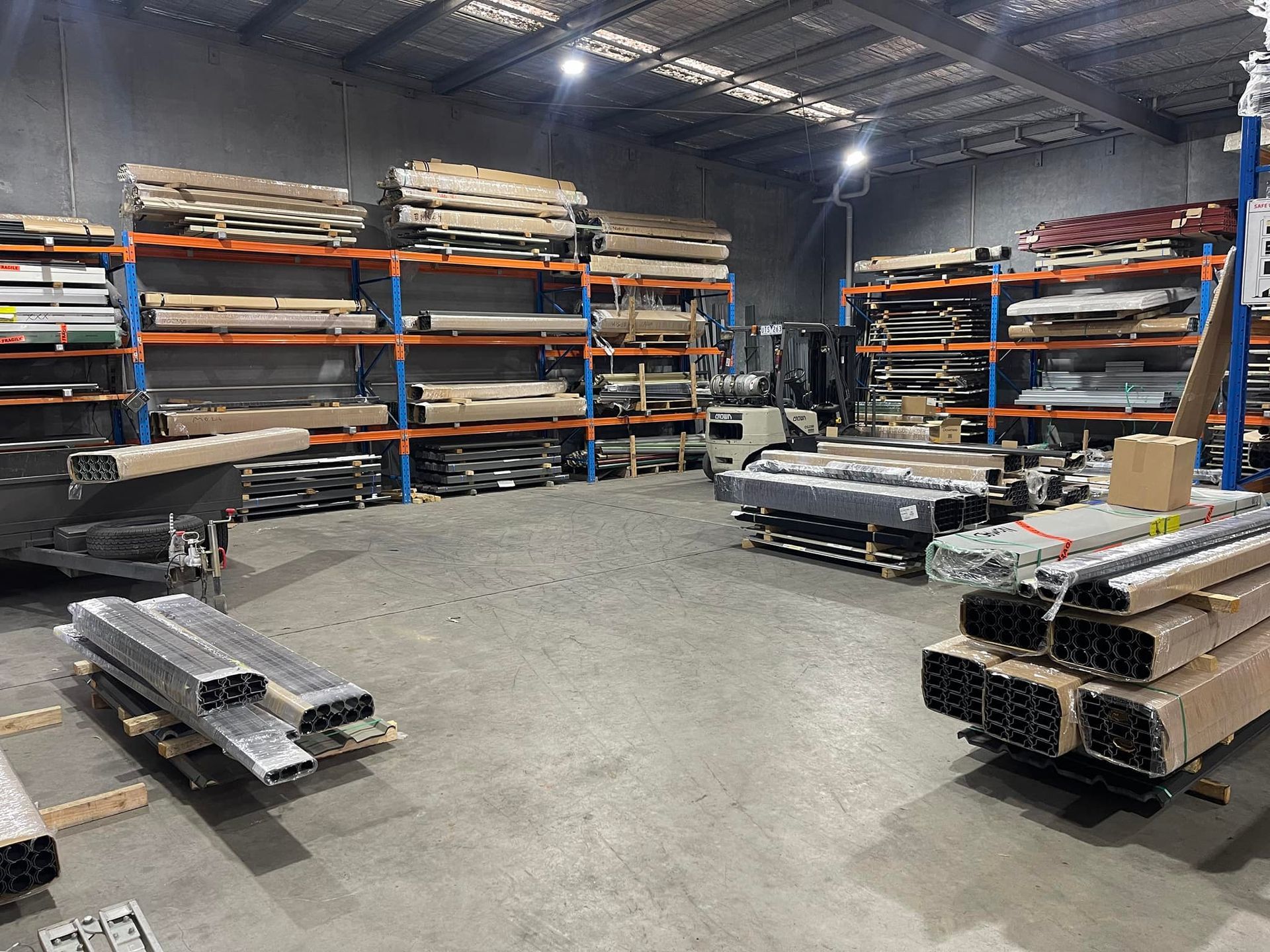 A large warehouse filled with lots of metal pieces.