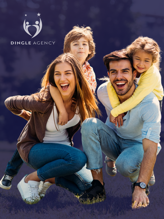 A family is posing for a picture together and smiling.