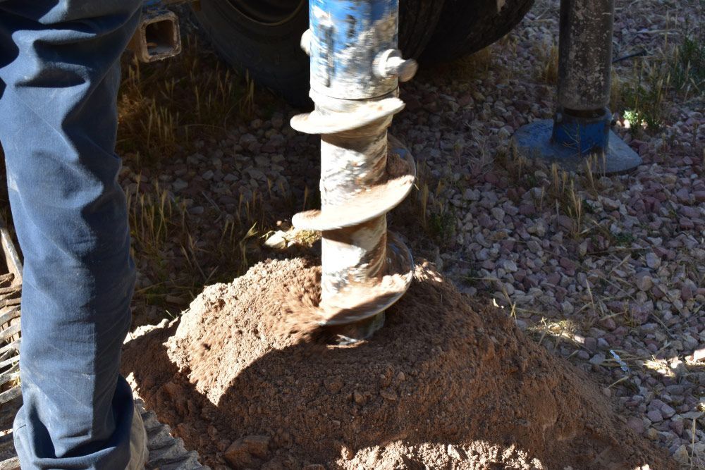 Auger Drilling in the Soil — Earthworks in Corowa, NSW