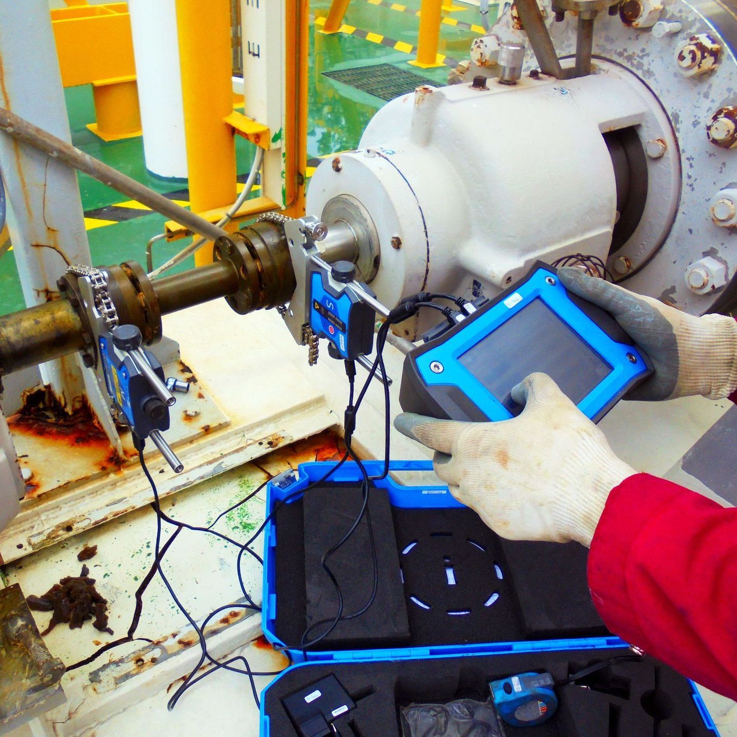 A person is holding a device that says ' ultrasonic ' on it