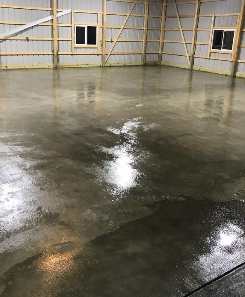 Empty Garage with Concrete Flooring — Burgettstown, PA — 22 Concrete Designs & Contracting