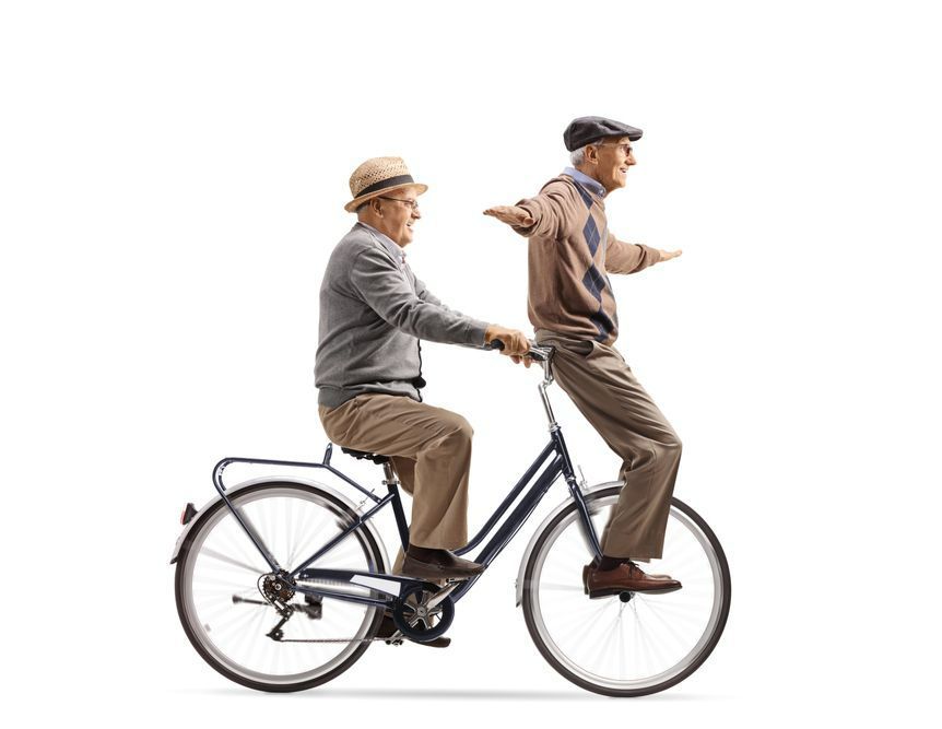 Funny Elderly Men Riding A Bicycle — Smiles on Hobart In Hobart TAS