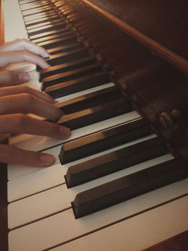 someone playing piano