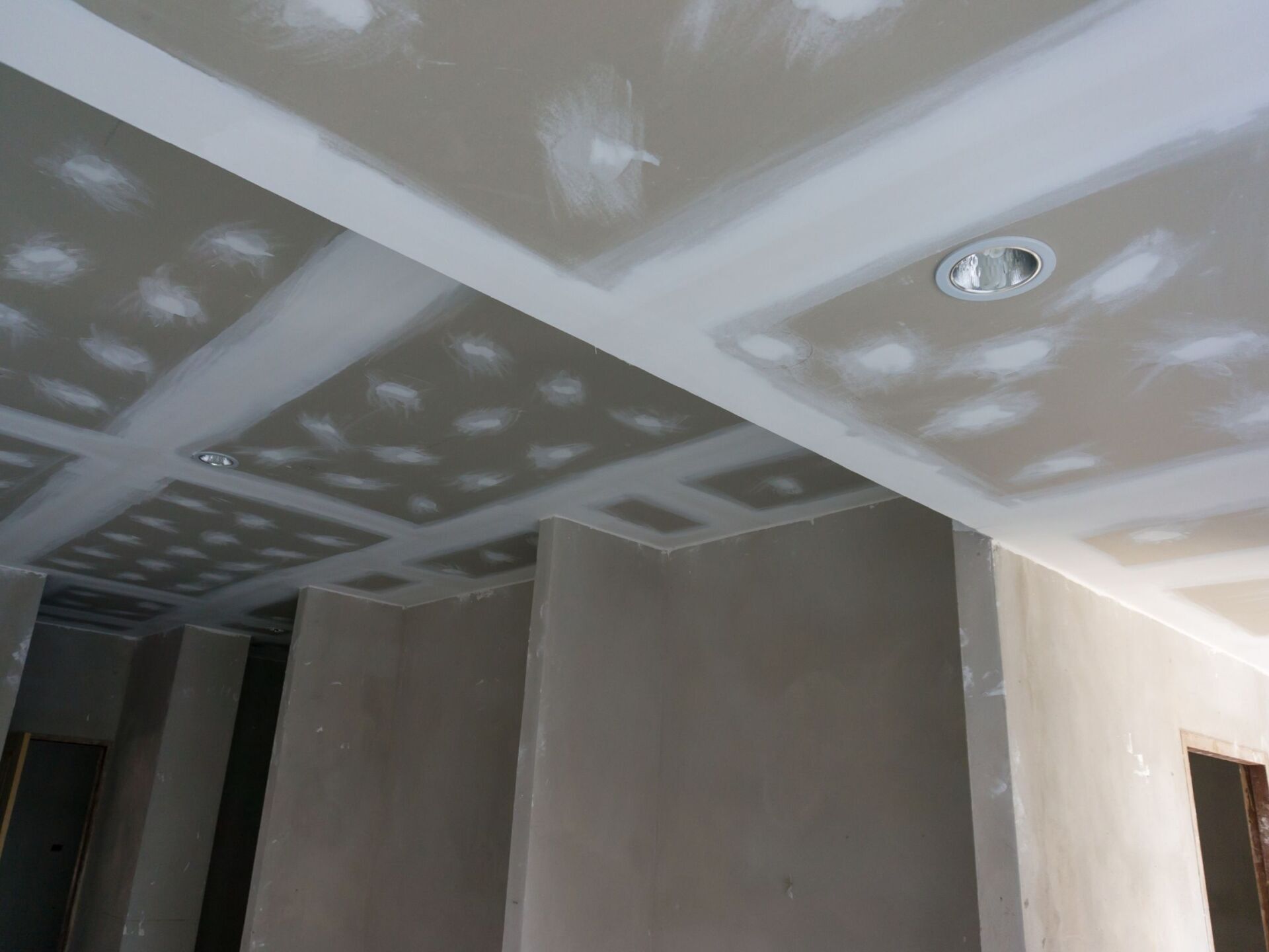 drywall and tape on a new ceiling