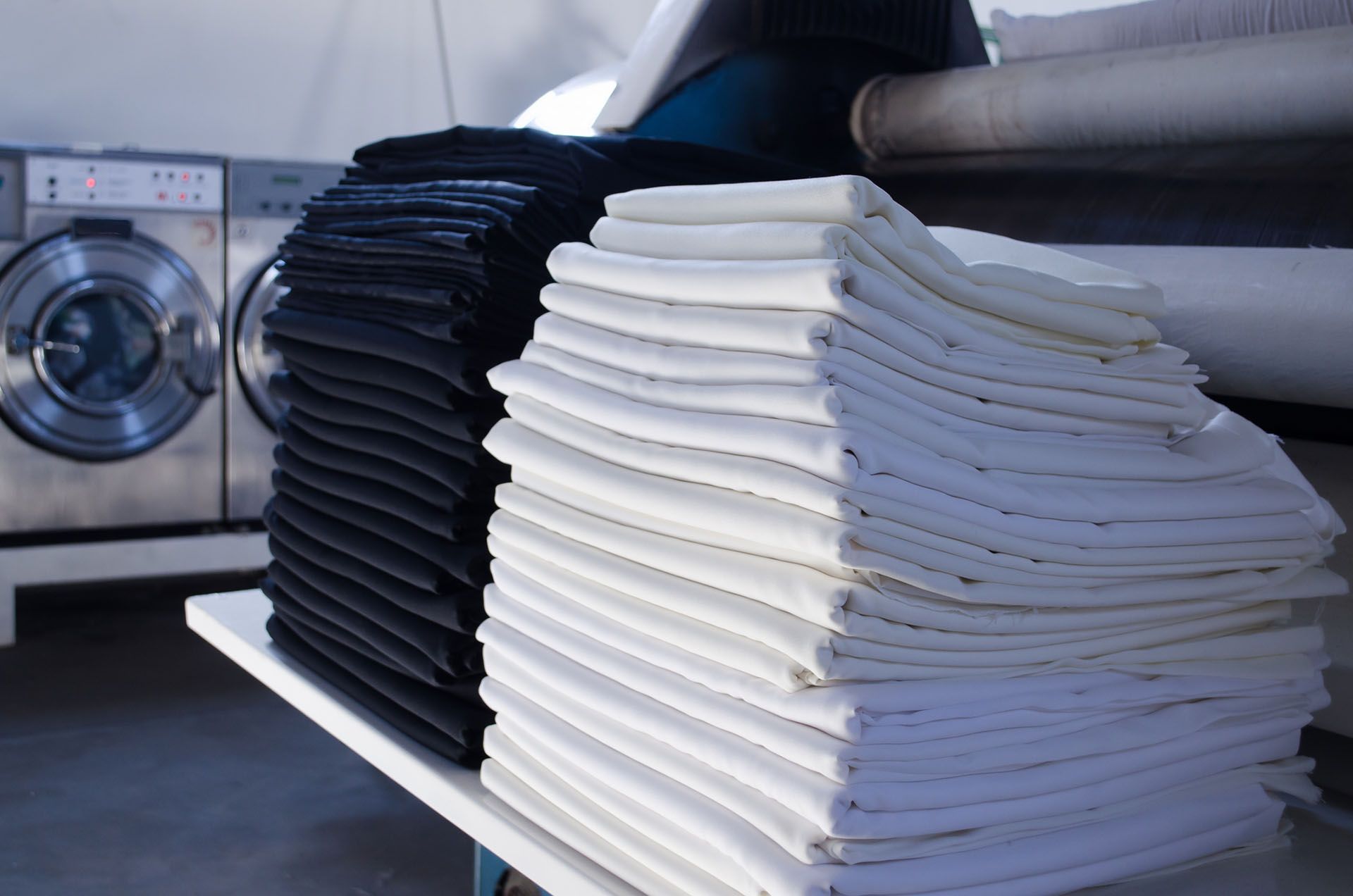 Stack of Folded Linens — Beatrice, NE — Soap Opera Laundry