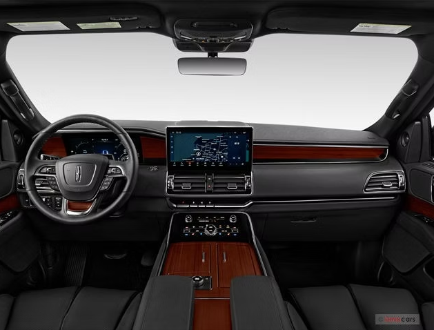 The interior of a lincoln navigator is shown with a steering wheel and dashboard.