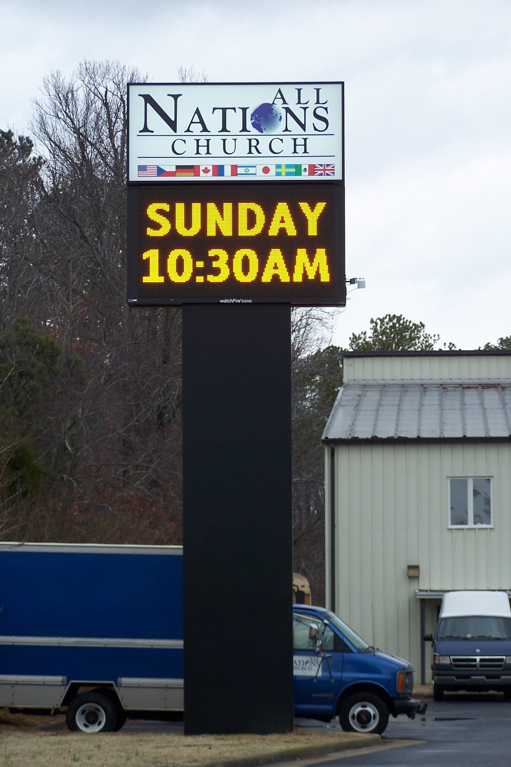 A sign for all nations church says sunday 10:30 am