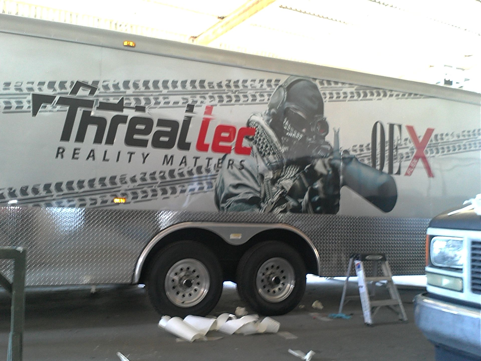 A trailer that says threattec reality matters on it