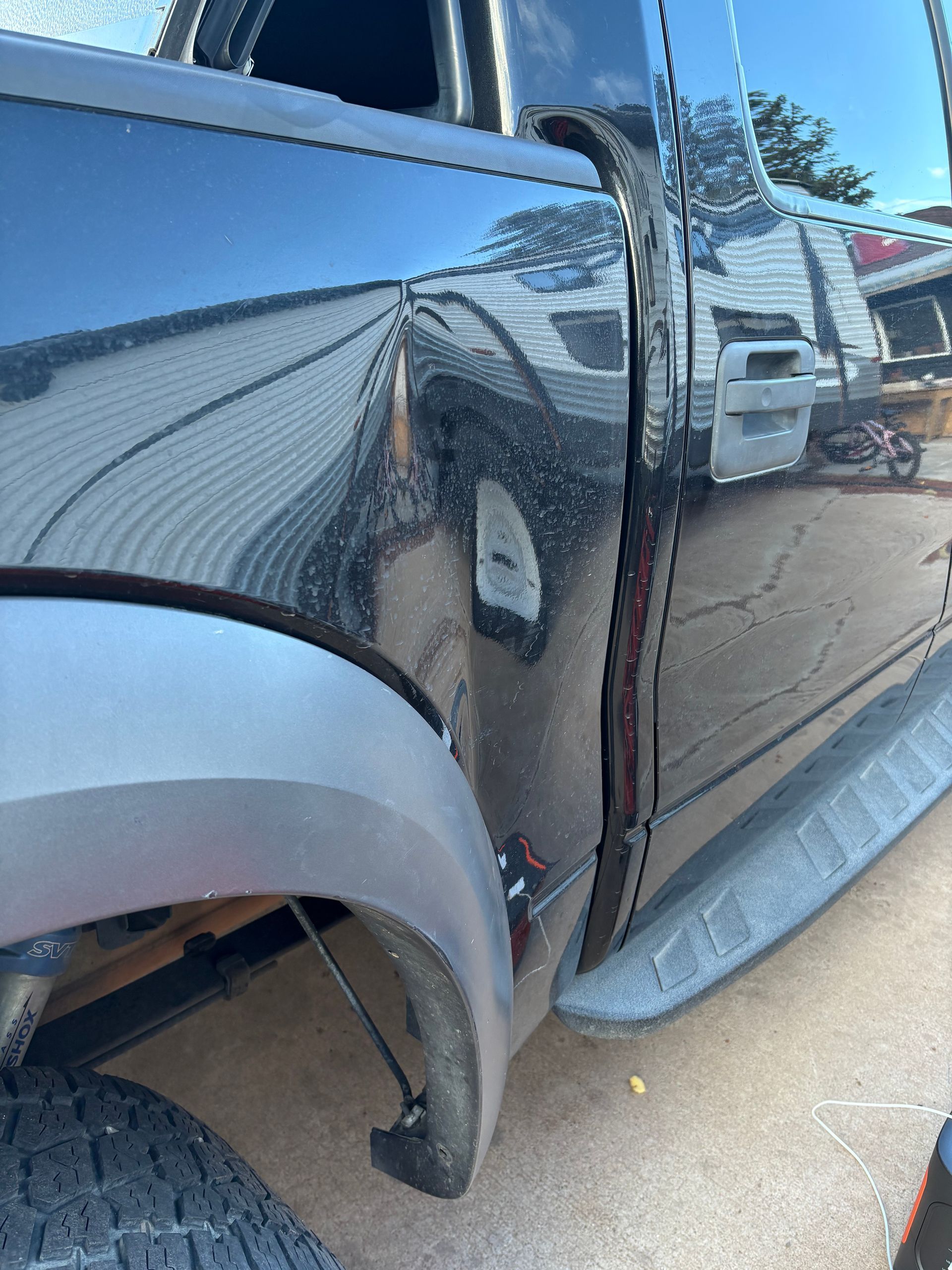 Ford Raptor Before Paintless Dent Repair, Williams AZ