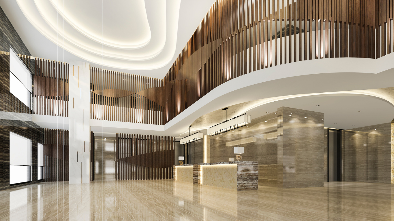 A large lobby with a curved ceiling and a reception desk.