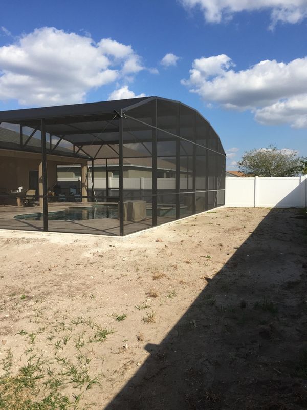 A Screened-in area with a pool inside – Valrico, FL - Salco Screens