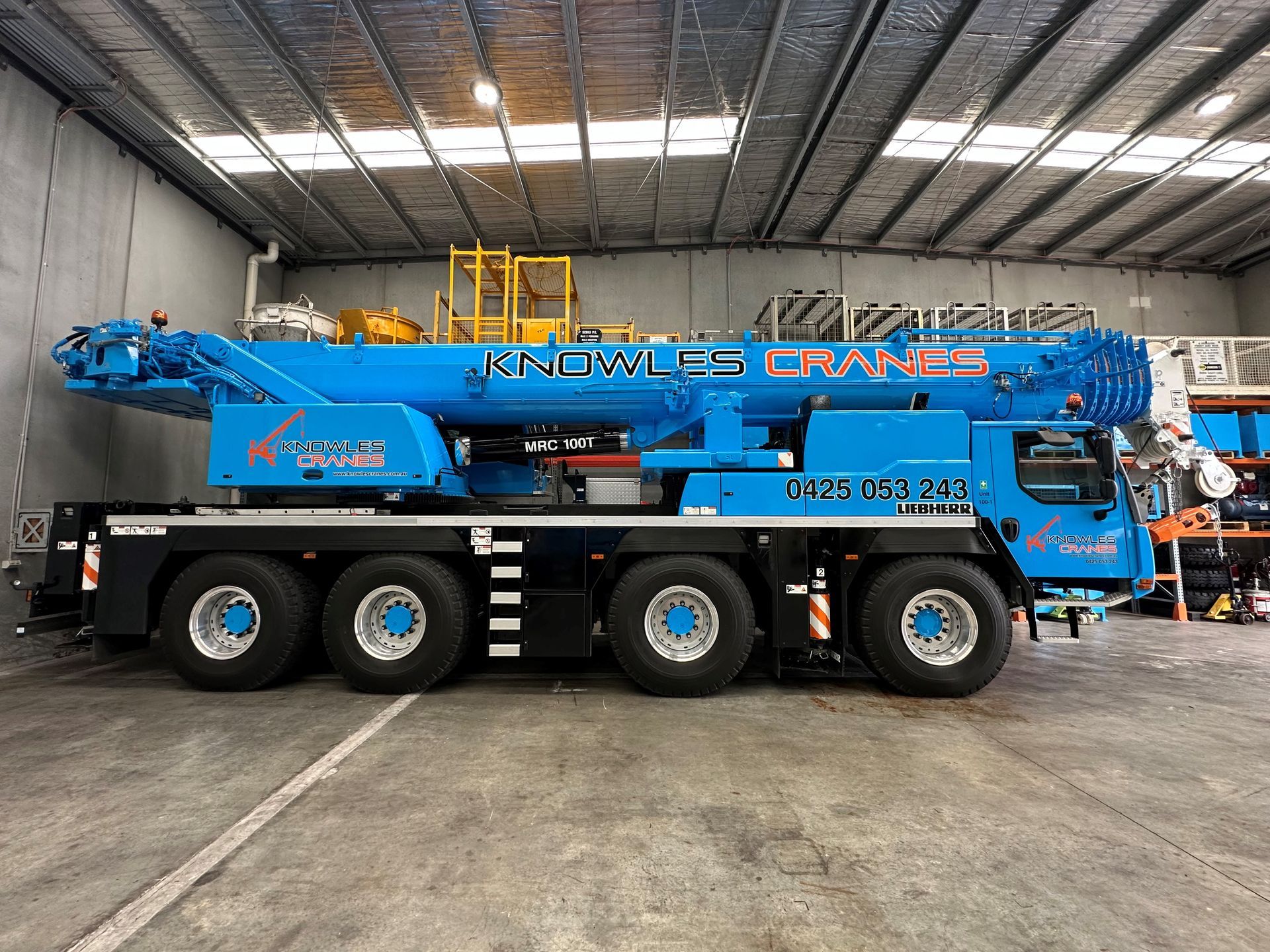 Dual crane lift in action — safely positioning industrial tanks with precision and power.