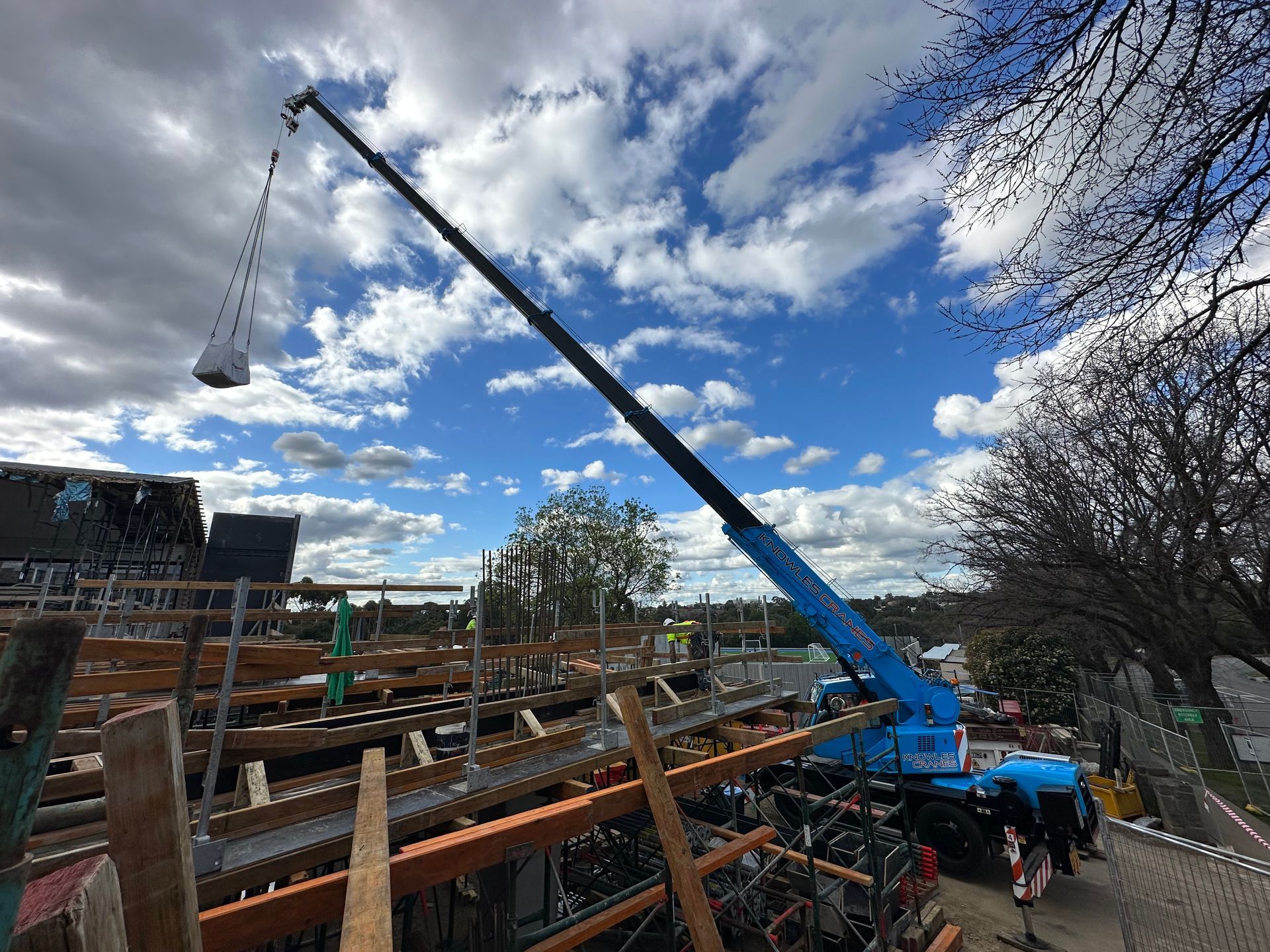 Crane assisting in construction