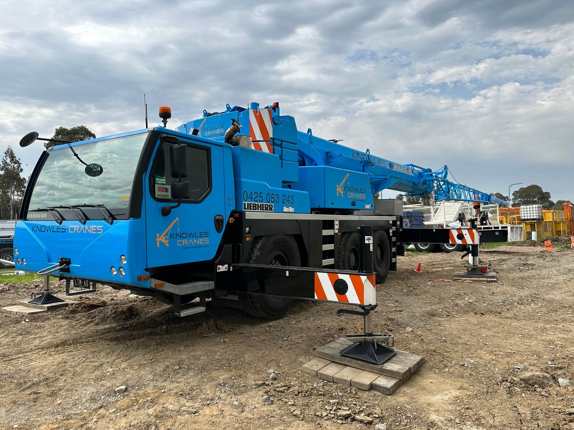 Crane with outriggers extended