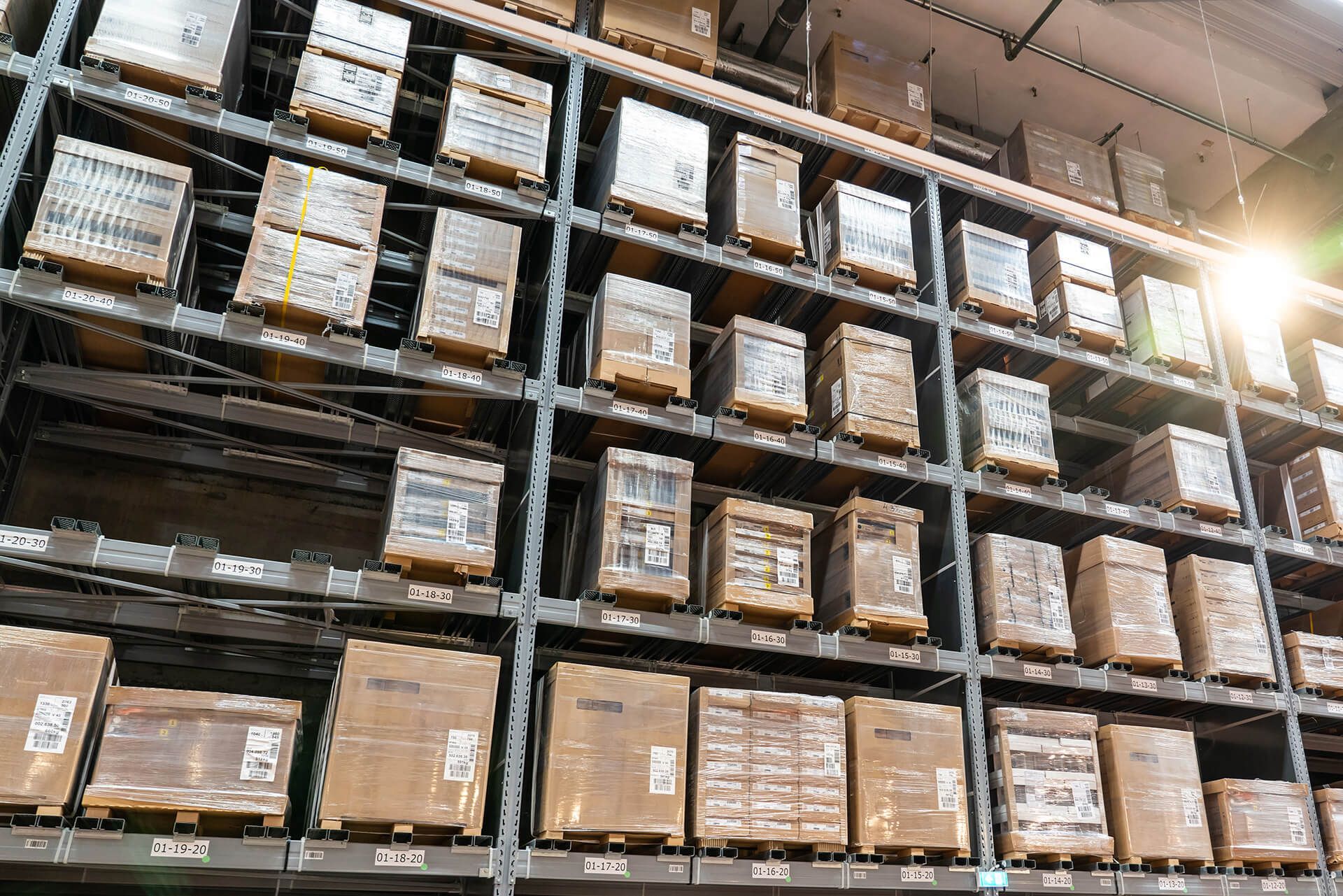 a warehouse filled with lots of wooden boxes