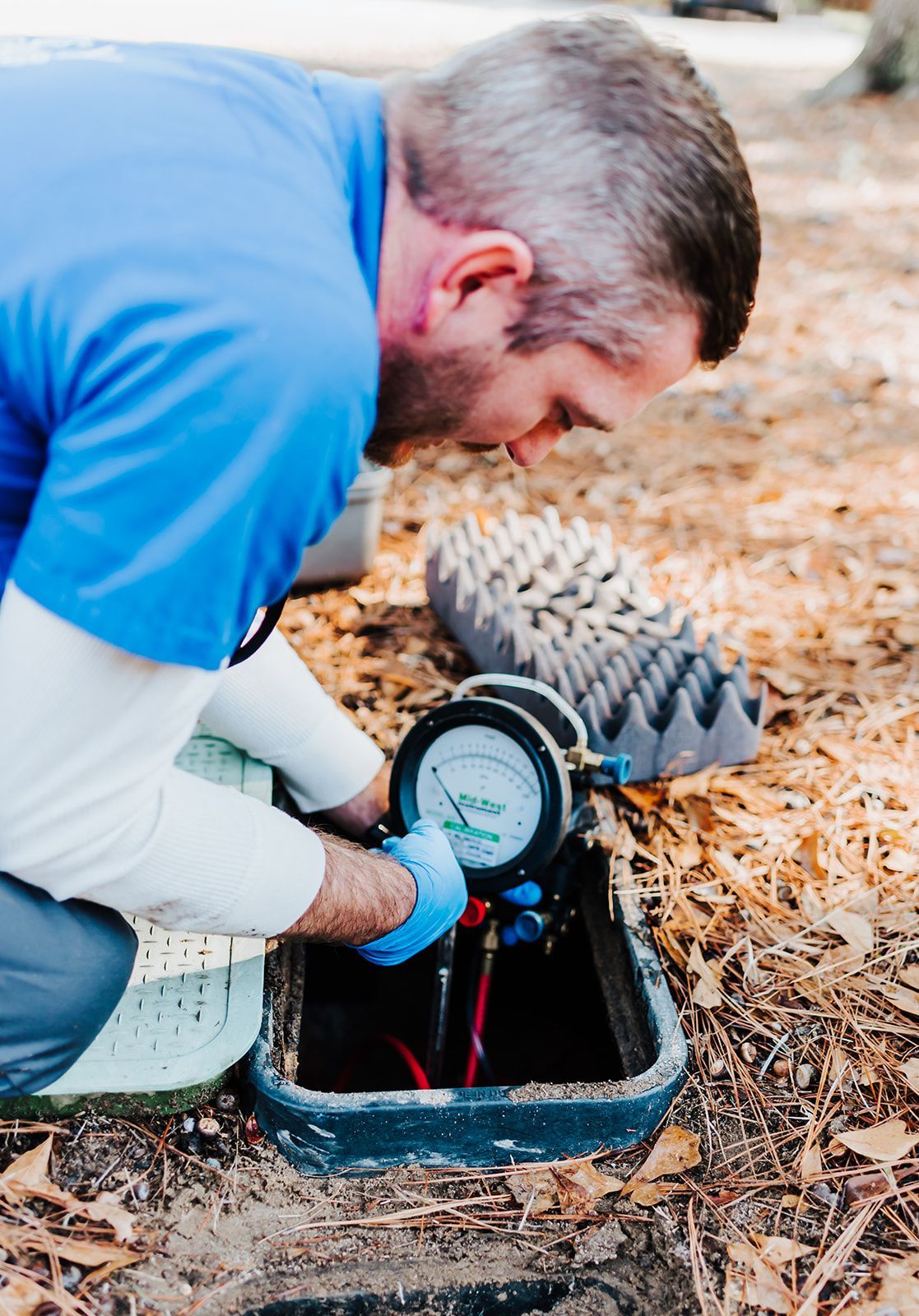 A close up of a shower head in a bathroom