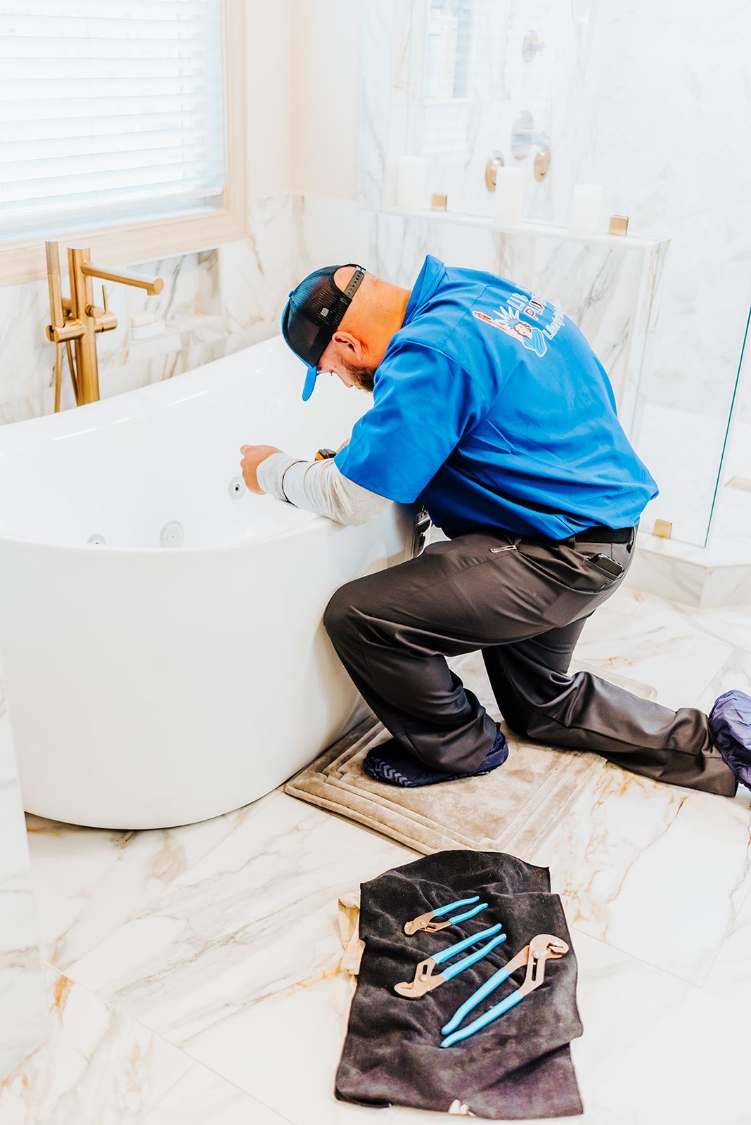 A close up of a shower head in a bathroom