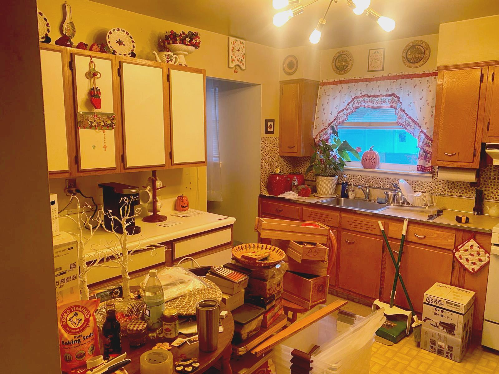 an outdated kitchen with lots of repairs