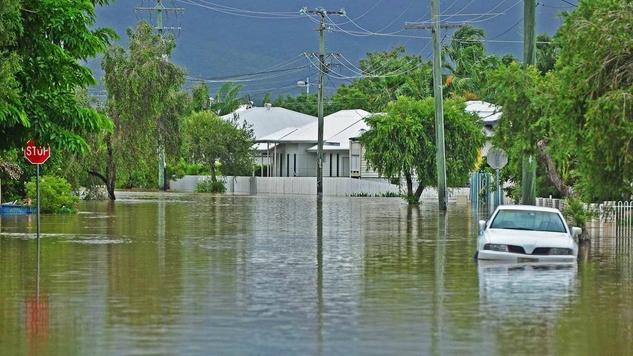 Flooded Residential Street — Builder In Whitsundays, QLD