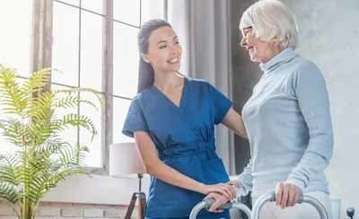 Professional Healthcare Staff Helping Elderly Woman — Lawrenceville, GA — Professional and Quality Home Care