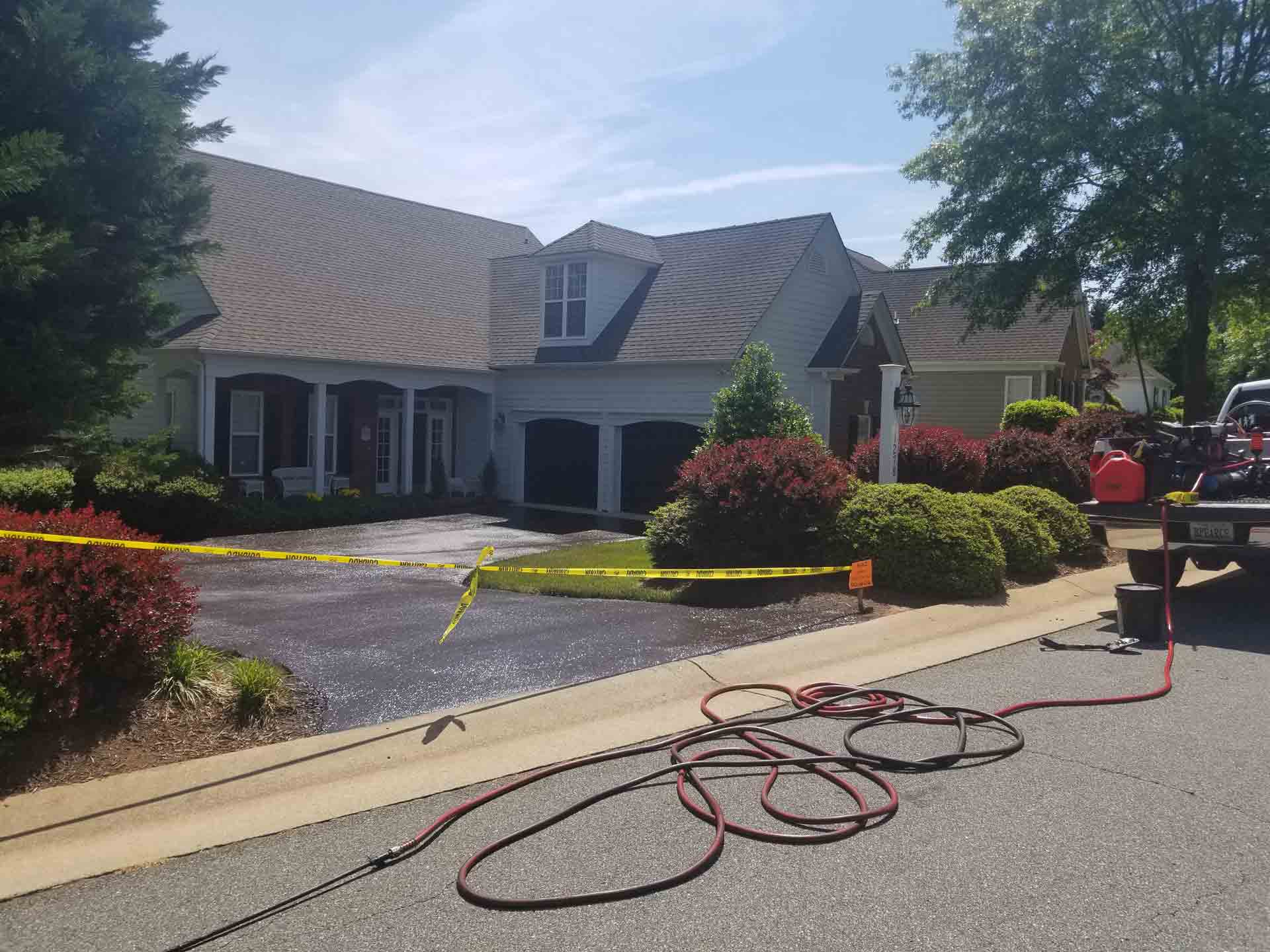 Modern House Driveway Sealcoating — Waynesboro, VA — Pearce Seal Coating