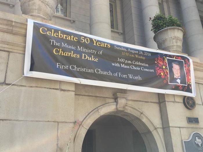 A banner on the side of a building that says celebrate 50 years