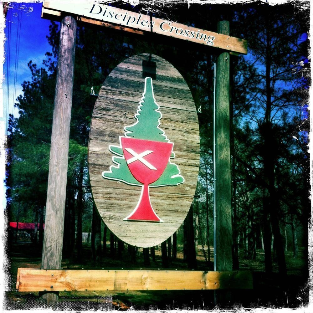 A sign that says disciples crossing on it