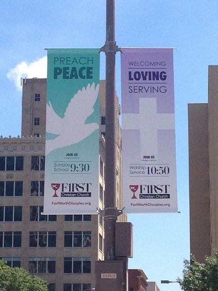 A sign that says preach peace welcomes loving serving