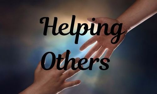 A person is reaching out to help another person.