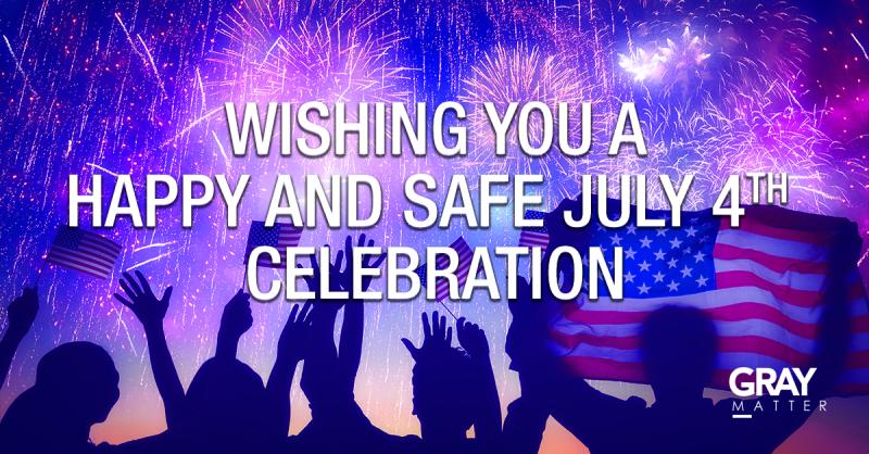 A group of people watching fireworks with the words wishing you a happy and safe july 4th celebration.