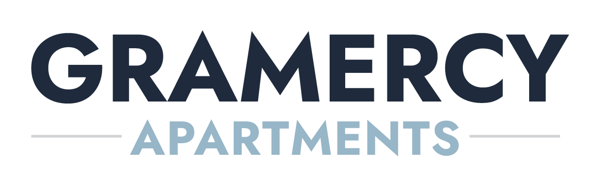 Gramercy Apartments logo in navy blue and light blue with a horizontal line separating the words.