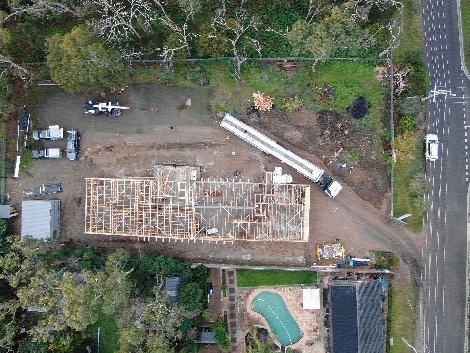 A House Is Being Built In The Middle Of A Dirt Field — KM Custom Homes In Mornington, VIC
